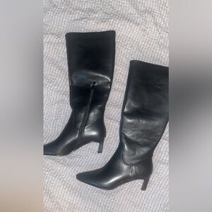 All black knee high pointed toe black boots with kitten heel